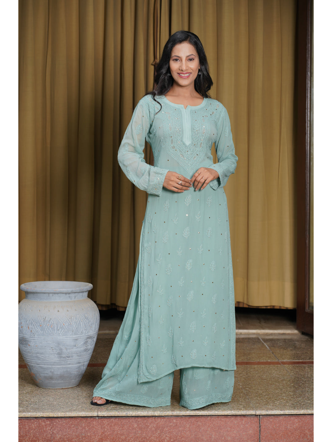 Saadgi hand embroidered chikankari pine green Mukaish rings work kurta with palazzo
