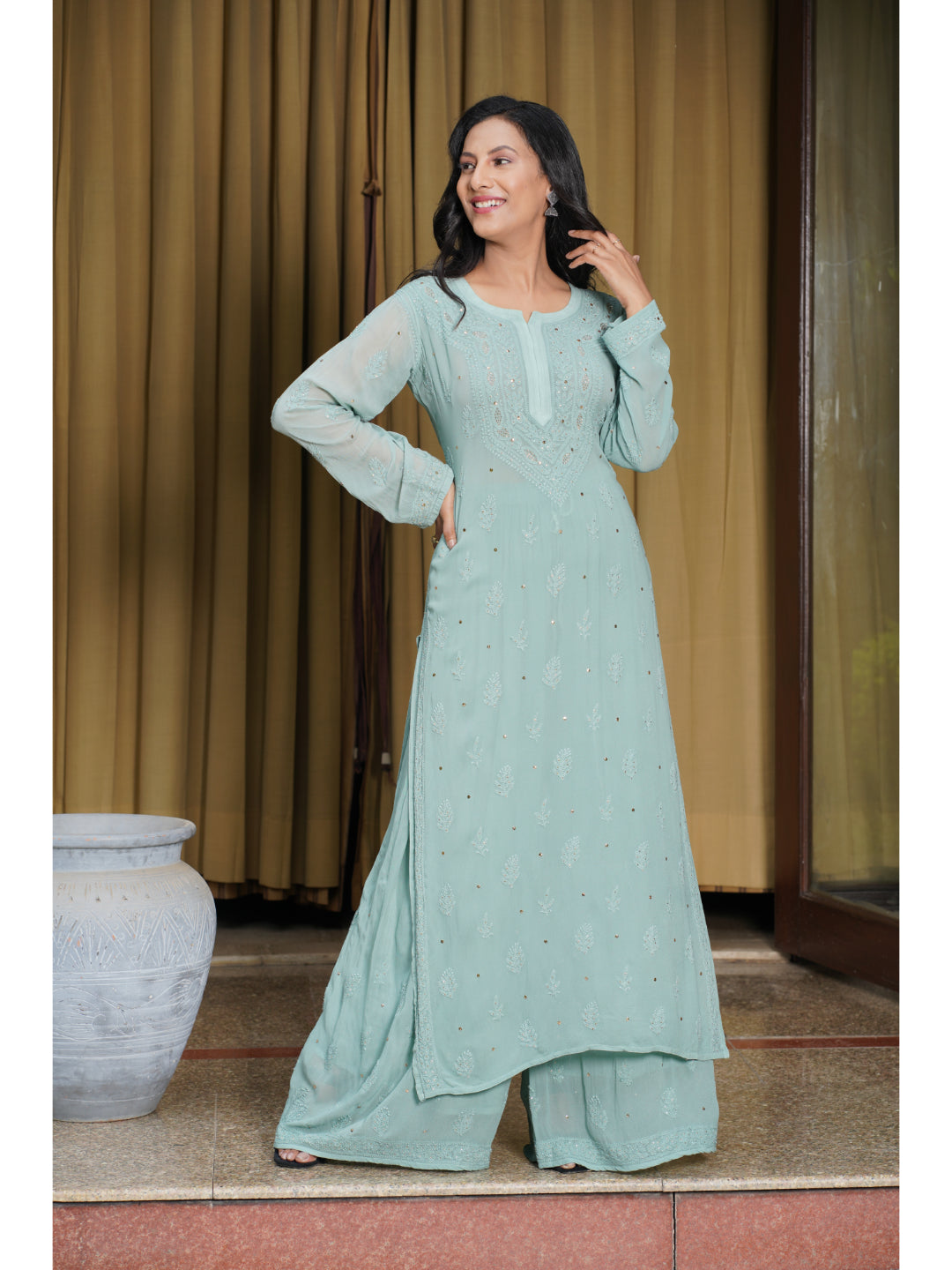 Saadgi hand embroidered chikankari pine green Mukaish rings work kurta with palazzo