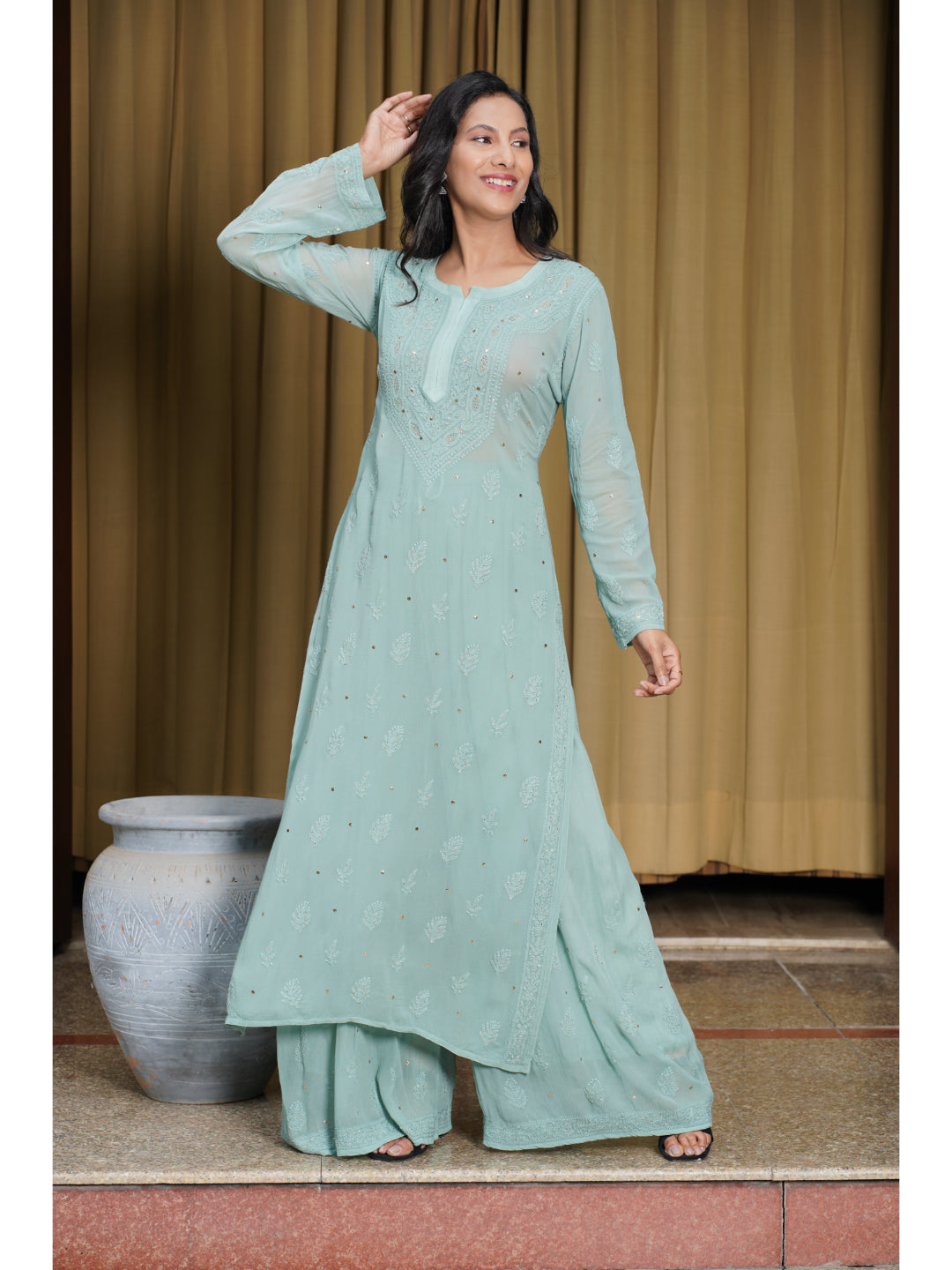 Saadgi hand embroidered chikankari pine green Mukaish rings work kurta with palazzo