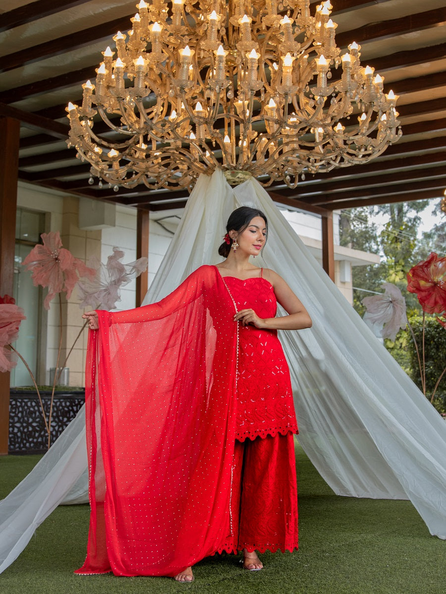 Niki Mehra's rayon schiffly sequin work embellished Red Gharara set & Dupatta