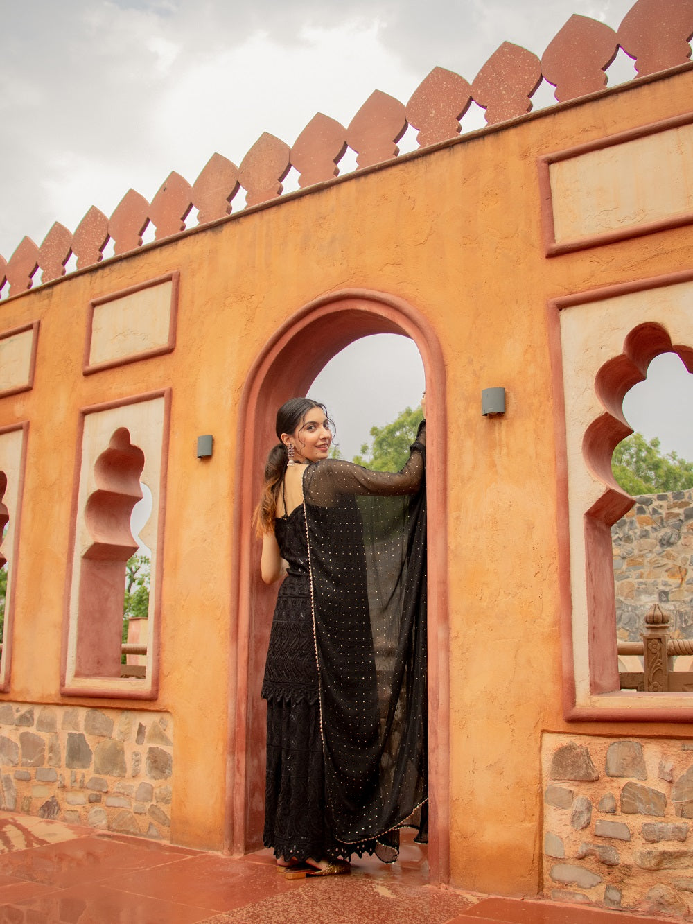 Niki Mehra's rayon schiffly sequence work Black Gharara set & Dupatta