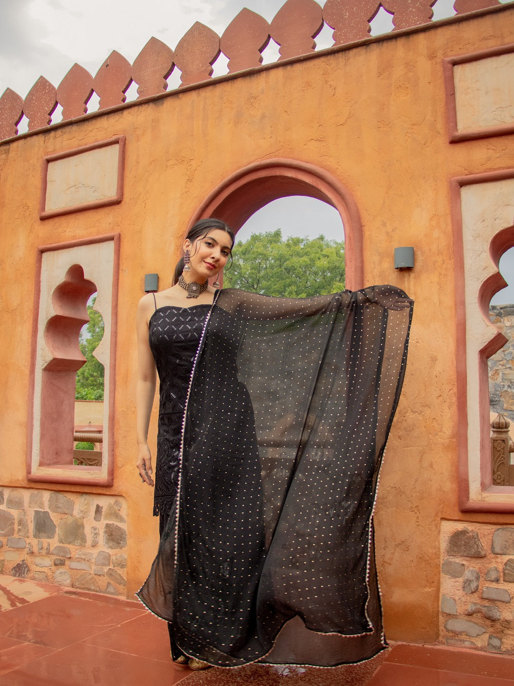 Niki Mehra's rayon schiffly sequence work Black Gharara set & Dupatta