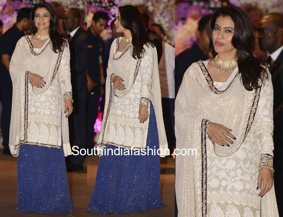 Be elegant and glamorous in this 3-piece formal set, crafted with exquisite chikankari and viscose georgette fabric with a traditional kajol inspired style. Lined with crepe fabric all over, this ivory Indo-Western look by Saadgi. chicken, chikan kurti, chikan suit, chikankari kurta for women, chikankari kurta, chikankari kurta set, chikankari short kurti, chikankari suit set, gharara, chikankari suits, hand crafted, lakhnavi kurti, lucknowi chikankari kurti, lucknowi kurti, lucknowi