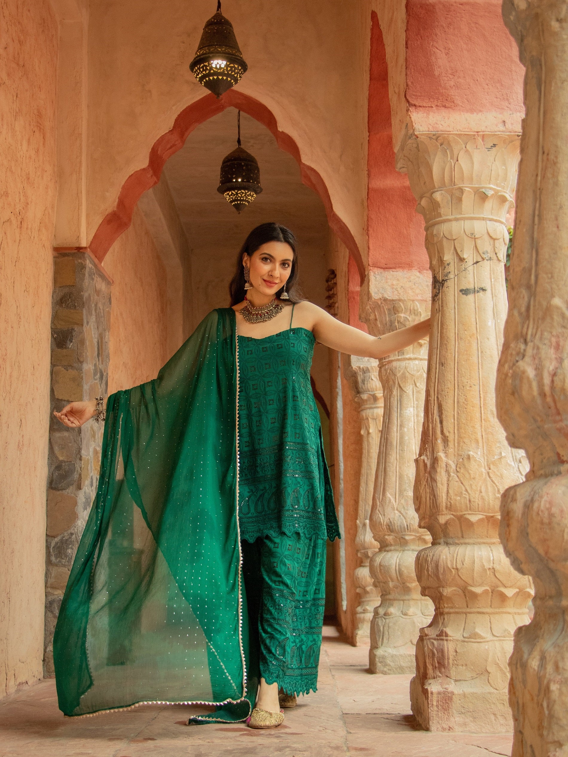 Saadgi designer set is crafted from high-quality  aachho rayon sequin chikankari, giving it a beautiful shimmer with rainbow sequin. Lined with pure crape and featuring a dupatta with Gotta Patti and mukaish work all over, chicken, chikan kurti, chikan suit, chikankari kurta for women, chikankari kurta, chikankari kurta set, chikankari short kurti, chikankari suit set, gharara, chikankari suits, hand crafted, lakhnavi kurti, lucknowi chikankari kurti, lucknowi kurti, lucknowi chikankari saree