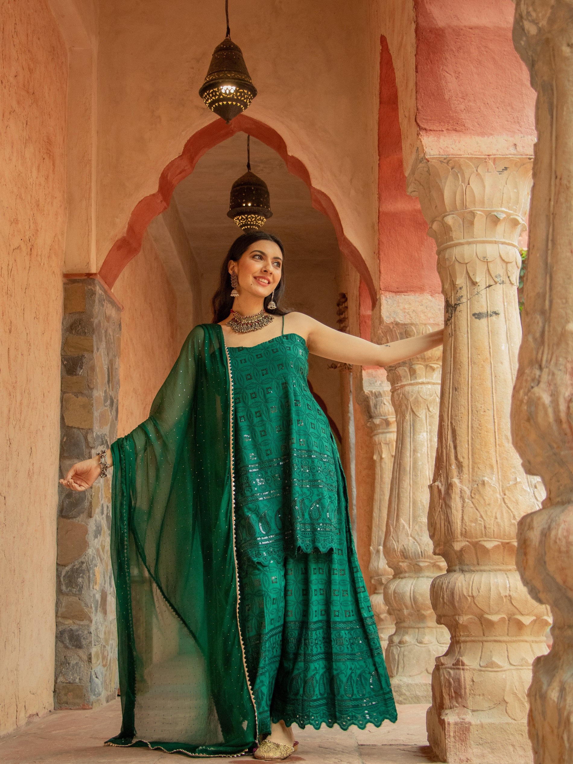 Saadgi designer set is crafted from high-quality  aachho rayon sequin chikankari, giving it a beautiful shimmer with rainbow sequin. Lined with pure crape and featuring a dupatta with Gotta Patti and mukaish work all over, chicken, chikan kurti, chikan suit, chikankari kurta for women, chikankari kurta, chikankari kurta set, chikankari short kurti, chikankari suit set, gharara, chikankari suits, hand crafted, lakhnavi kurti, lucknowi chikankari kurti, lucknowi kurti, lucknowi chikankari saree