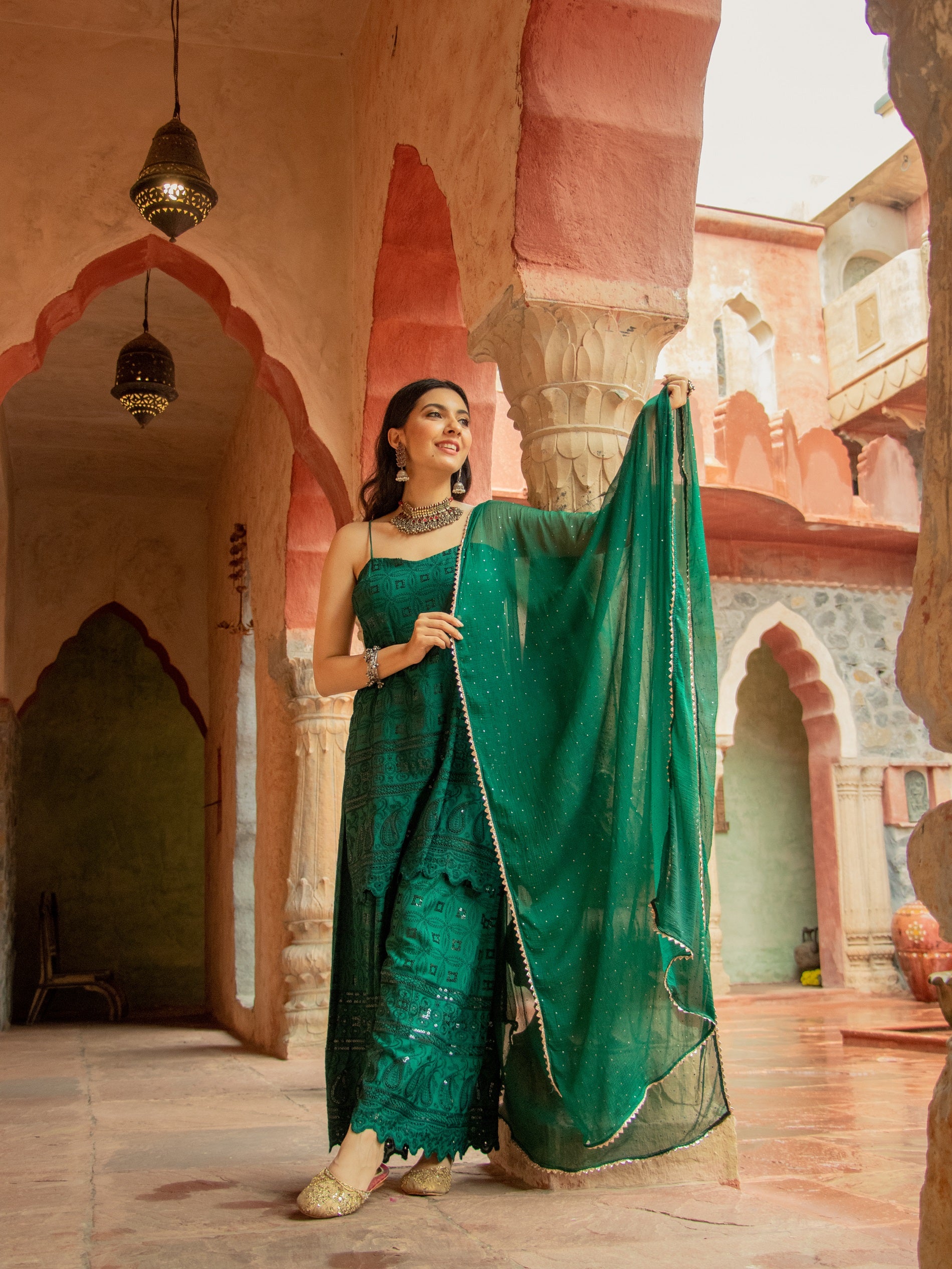 Saadgi designer set is crafted from high-quality  aachho rayon sequin chikankari, giving it a beautiful shimmer with rainbow sequin. Lined with pure crape and featuring a dupatta with Gotta Patti and mukaish work all over, chicken, chikan kurti, chikan suit, chikankari kurta for women, chikankari kurta, chikankari kurta set, chikankari short kurti, chikankari suit set, gharara, chikankari suits, hand crafted, lakhnavi kurti, lucknowi chikankari kurti, lucknowi kurti, lucknowi chikankari saree