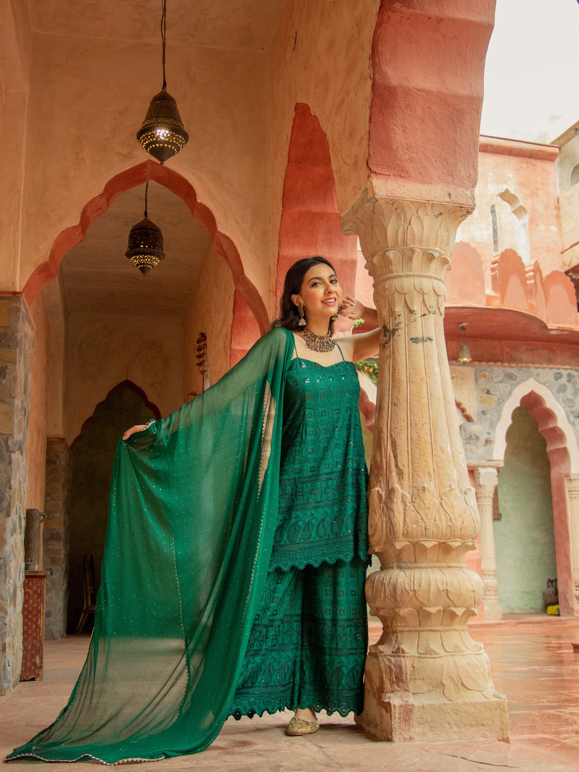 Saadgi designer set is crafted from high-quality  aachho rayon sequin chikankari, giving it a beautiful shimmer with rainbow sequin. Lined with pure crape and featuring a dupatta with Gotta Patti and mukaish work all over, chicken, chikan kurti, chikan suit, chikankari kurta for women, chikankari kurta, chikankari kurta set, chikankari short kurti, chikankari suit set, gharara, chikankari suits, hand crafted, lakhnavi kurti, lucknowi chikankari kurti, lucknowi kurti, lucknowi chikankari saree