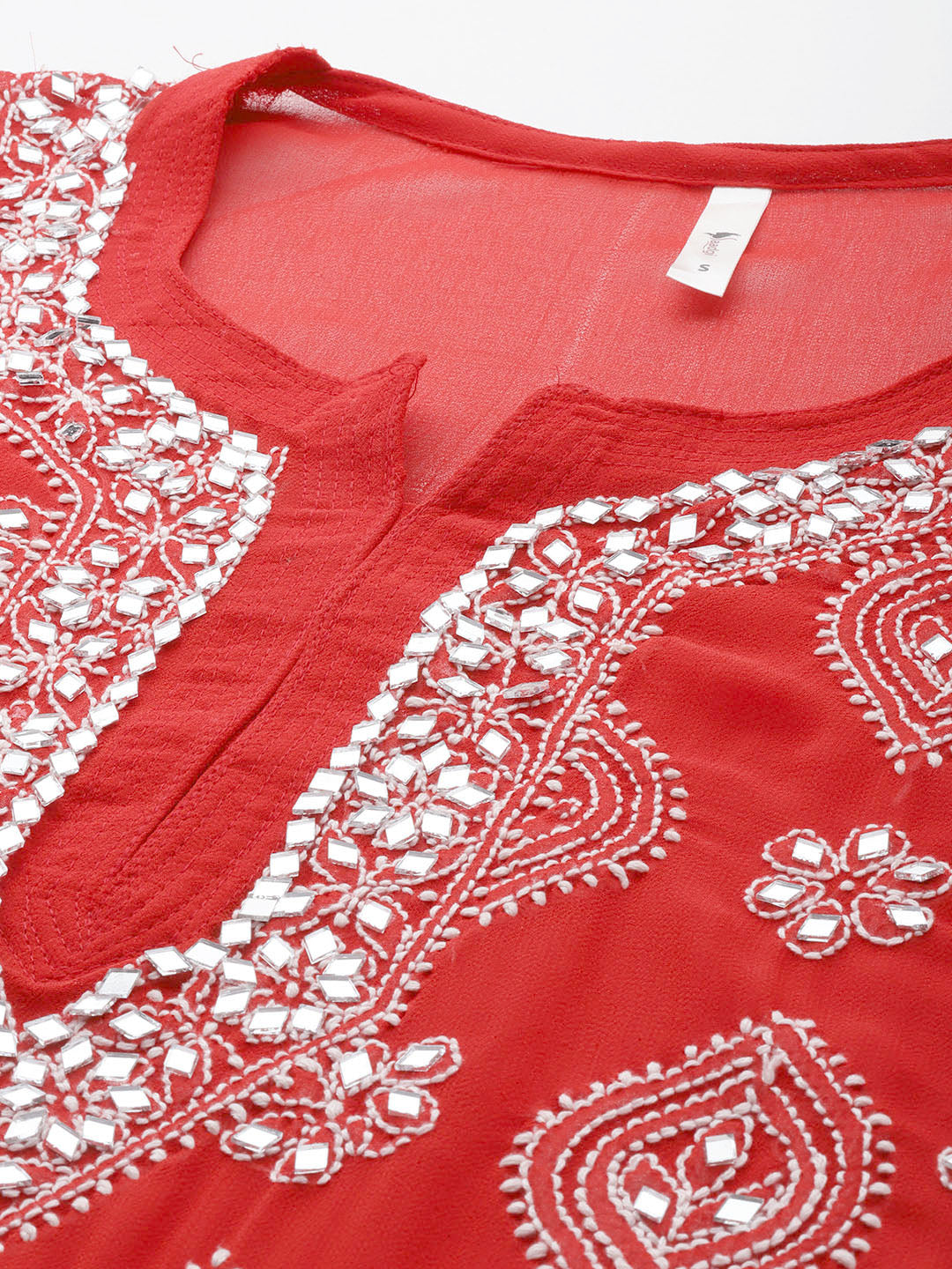 This exquisite features traditional chikankari mirror work and authentic embroidery, making it perfect for festive and party wear. Enjoy the luxurious look of chikankari work with the timeless elegance. The art of embroidery is in new trend of ethnic and Indo Western culture. The very first thing that catches the attraction is the Chikankari with Mirror work and though this outfit works out the best In all the perfect evenings and day family gathering.