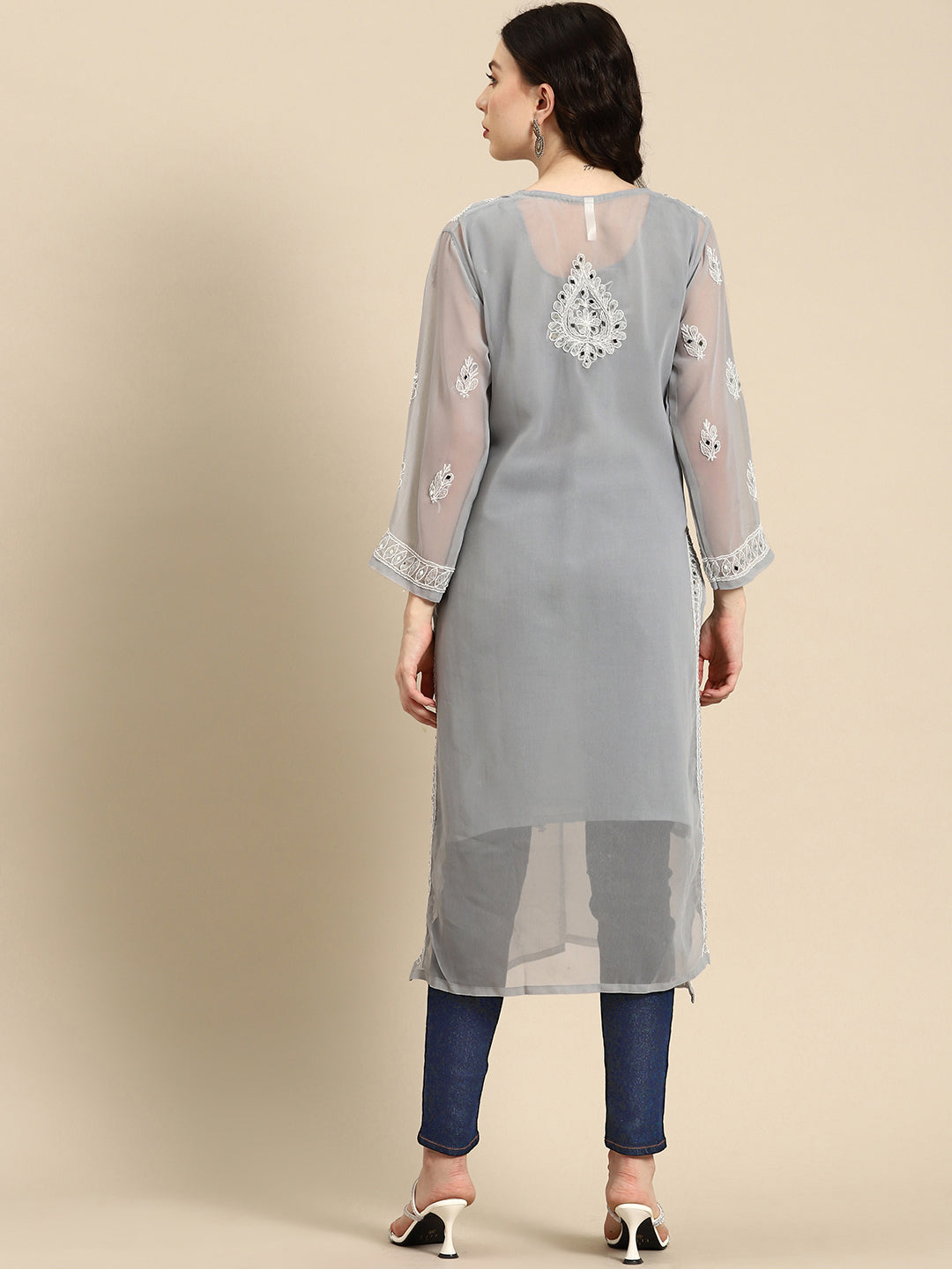 This exquisite features traditional chikankari mirror work and authentic embroidery, making it perfect for festive and party wear. Enjoy the luxurious look of chikankari work with the timeless elegance. The art of embroidery is in new trend of ethnic and Indo Western culture. The very first thing that catches the attraction is the Chikankari with Mirror work and though this outfit works out the best In all the perfect evenings and day family gathering.chikan kurti with laknavi chikan kurta for women