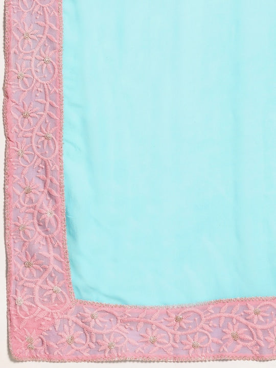 This Saadgi Chikankari Bordered Pink & Blue Viscose Georgette Saree is designed with a machine chikankari border with gold zari work and a contrast lively color. It's perfect for both formal wear and family functions, and comes with an unstitched blouse. Crafted by the renowned Saadgi brand, this saree makes a perfect statement for every occasion. party wear sarees, organza sarees, chicken, chickenkari, chicken saree, lucknowi chikankari saree, saree